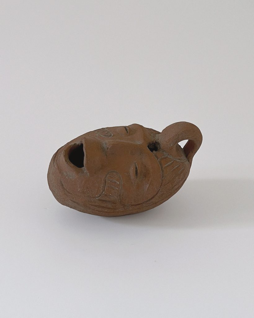 Anthropomorphic Clay Figurine